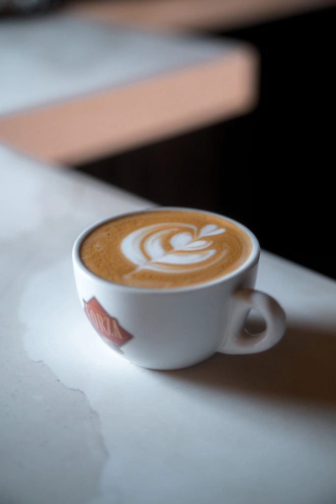 A latte with latte art at Penelope Bakehouse in Scarborough