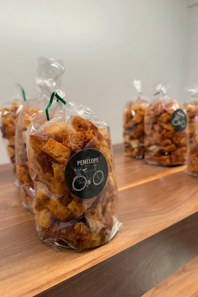 Bags of sourdough croutons on the bakery shelf